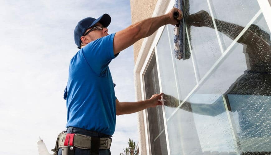 Certified Cleaner Cleaning WIndow glass